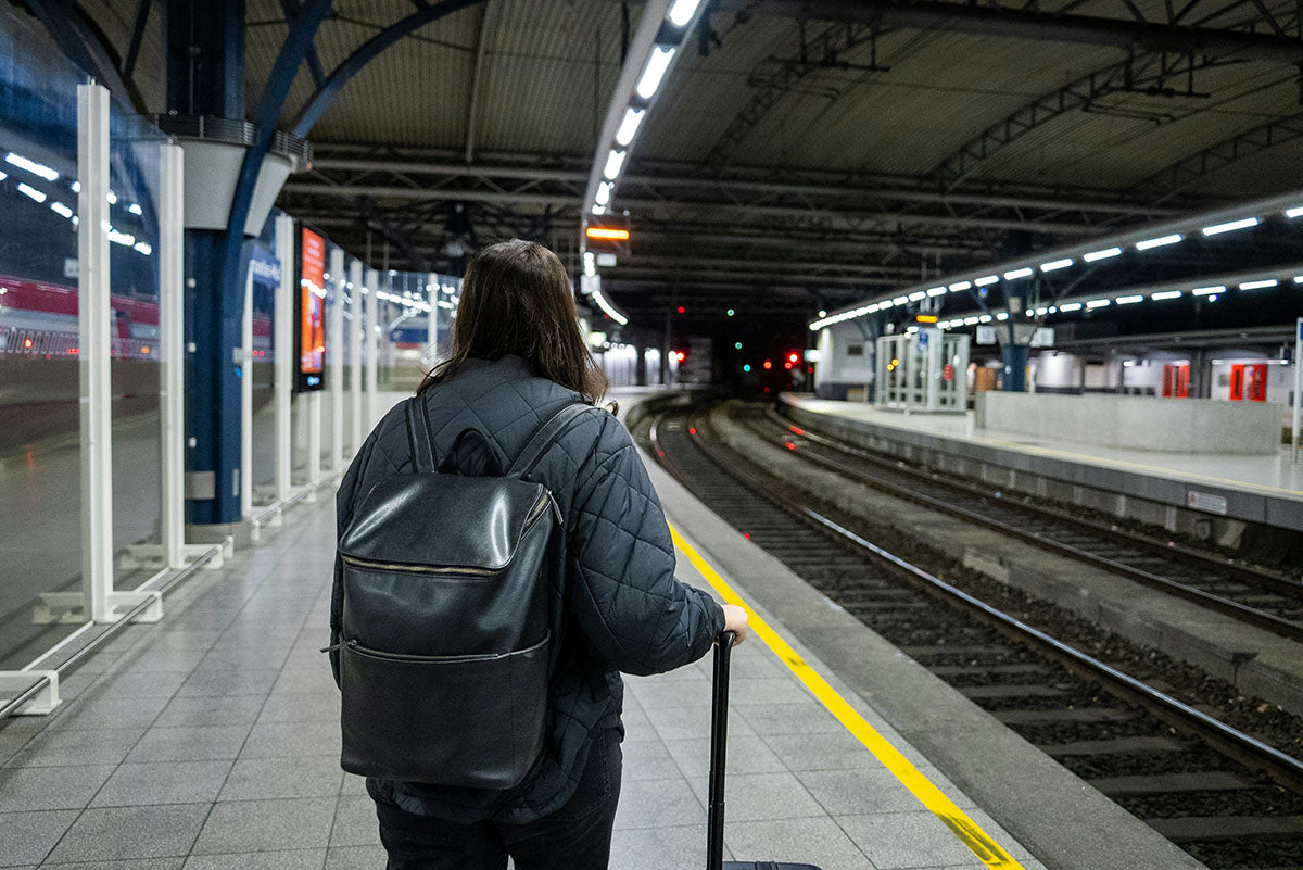 Girl at training station with bag