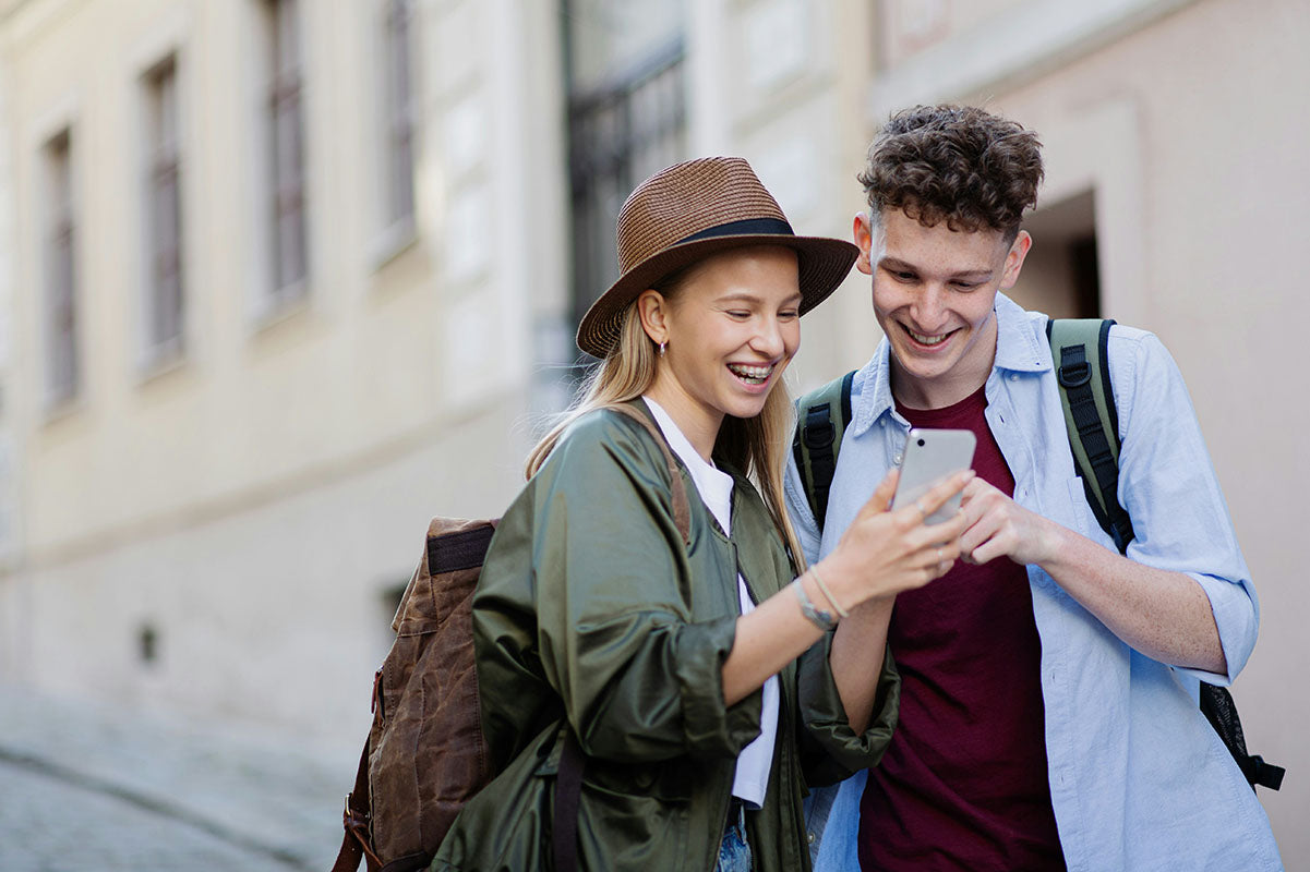 Couple looking at an iPhone